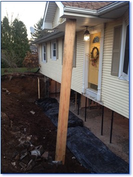 Removal of the failing foundation wall